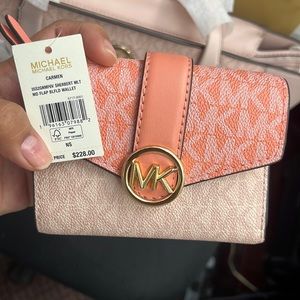 Selling brand new bad with wallet original no receipt as for it was a gift